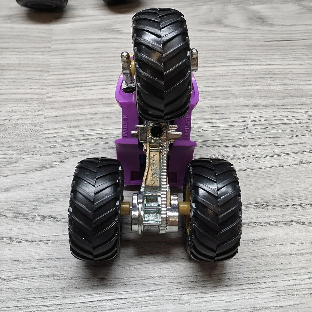 Hotwheels Monster Trucks Lot - Carbonator, Buns Of Steel, Unimog, And Tuk N Roll